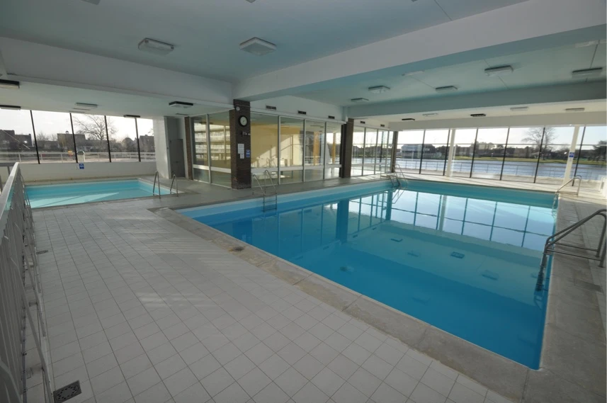 Appartement (rez) avec accès piscine couverte